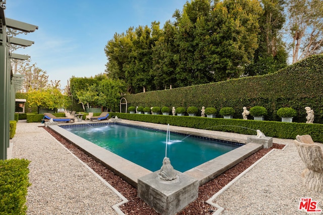 view of pool with pool water feature