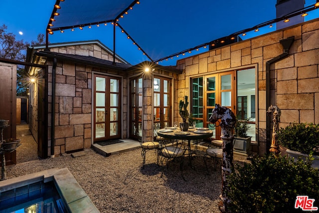 view of patio at night