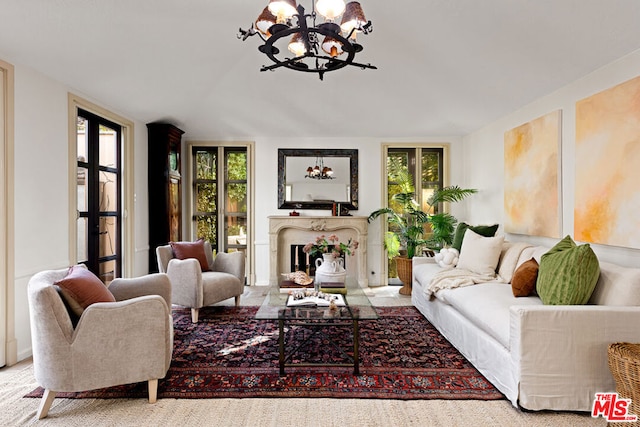 living room featuring a notable chandelier