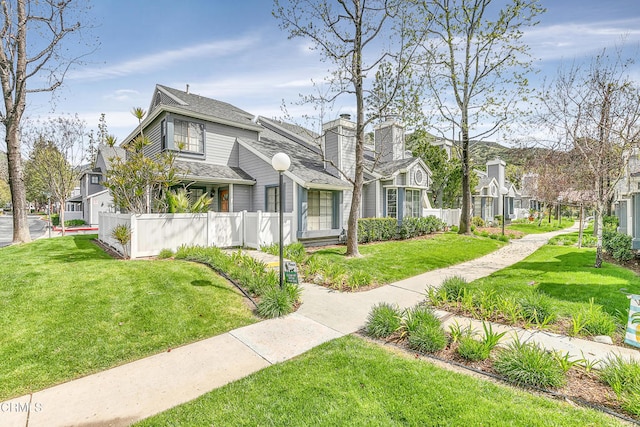 view of front of home featuring a front lawn