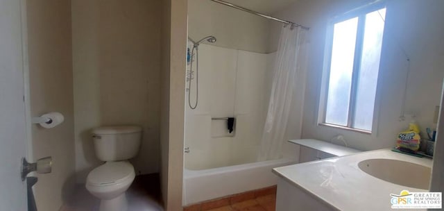 full bathroom featuring vanity, shower / tub combo, and toilet