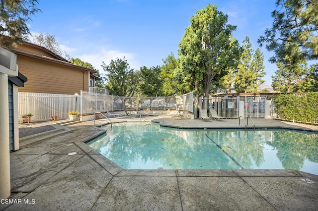 view of pool with a patio