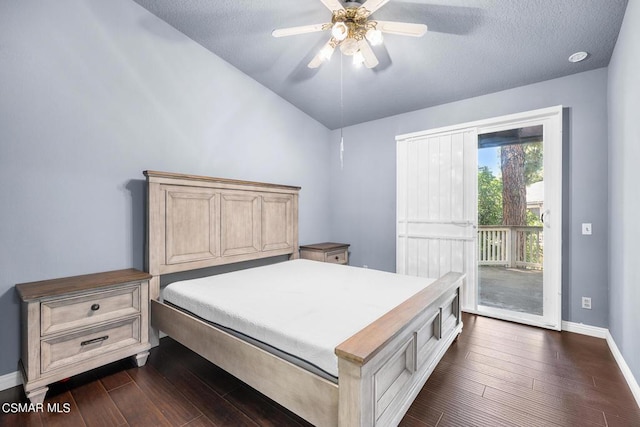 bedroom featuring a textured ceiling, access to outside, dark hardwood / wood-style floors, and ceiling fan