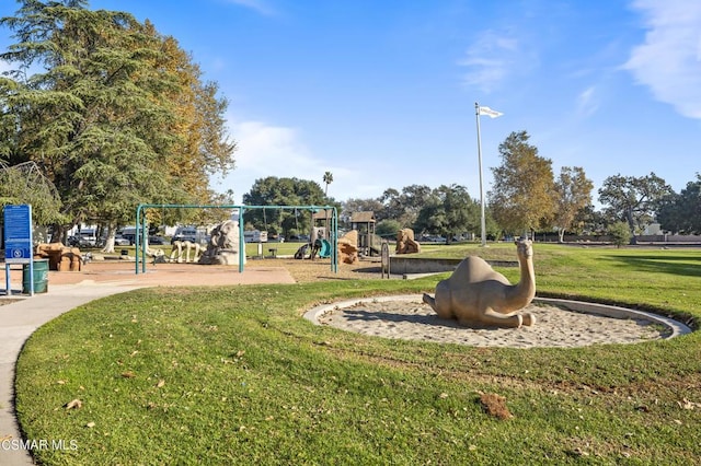 view of play area with a yard