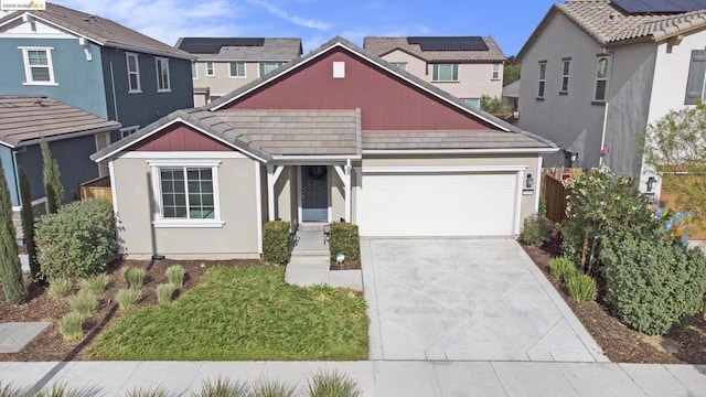 view of front of property featuring a garage