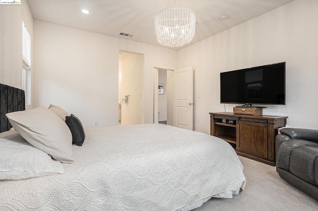 bedroom featuring light colored carpet and an inviting chandelier