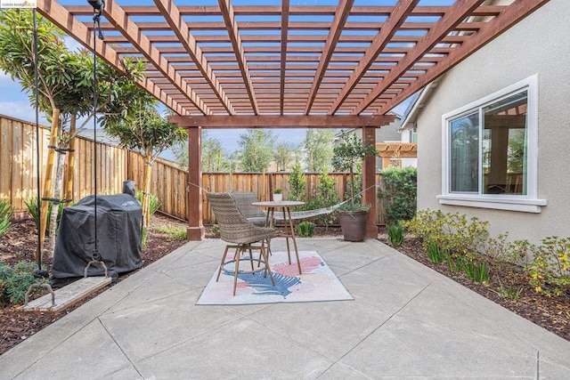 view of patio / terrace featuring a pergola and area for grilling