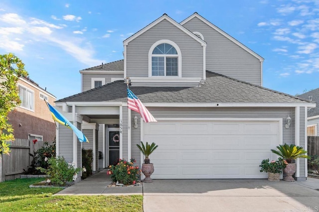 view of property featuring a front lawn