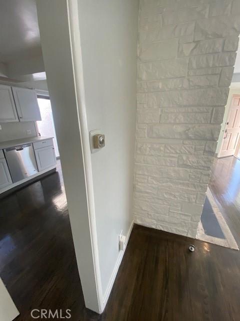 interior space featuring dark wood-type flooring