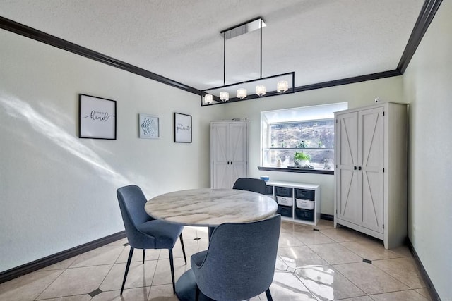 dining room featuring light tile patterned flooring, crown molding, and a textured ceiling