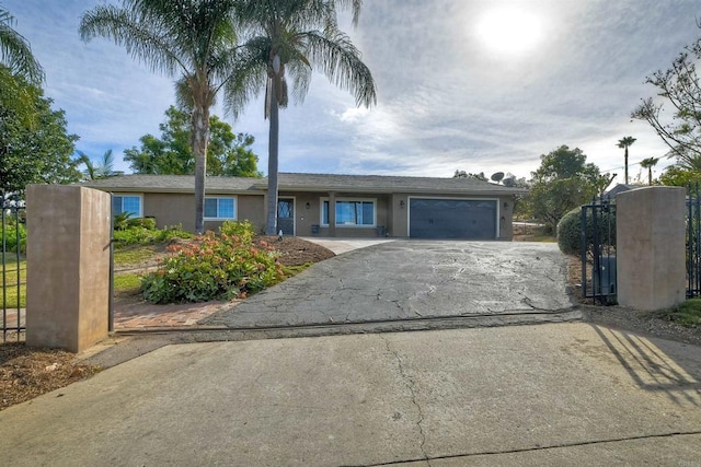 single story home featuring a garage