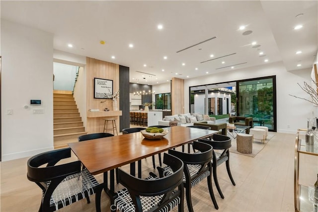 dining room featuring light wood-type flooring