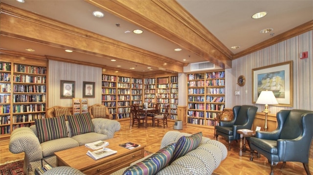 living area with beamed ceiling, built in shelves, crown molding, and light parquet flooring