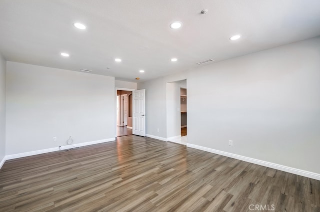 empty room featuring dark hardwood / wood-style floors