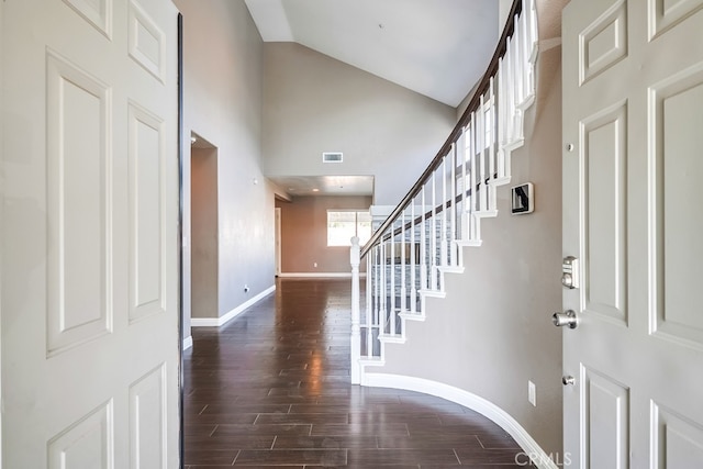 foyer with a towering ceiling