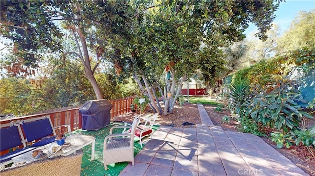 2049 Argyle Ave, Los Angeles, CA 90068 - fenced backyard featuring grilling area and a patio