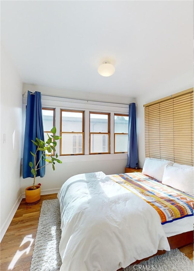 2049 Argyle Ave, Los Angeles, CA 90068 - bedroom featuring wood finished floors and baseboards