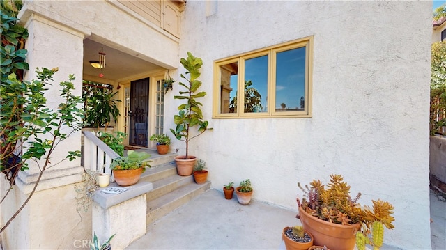 2049 Argyle Ave, Los Angeles, CA 90068 - doorway to property with stucco siding and covered porch