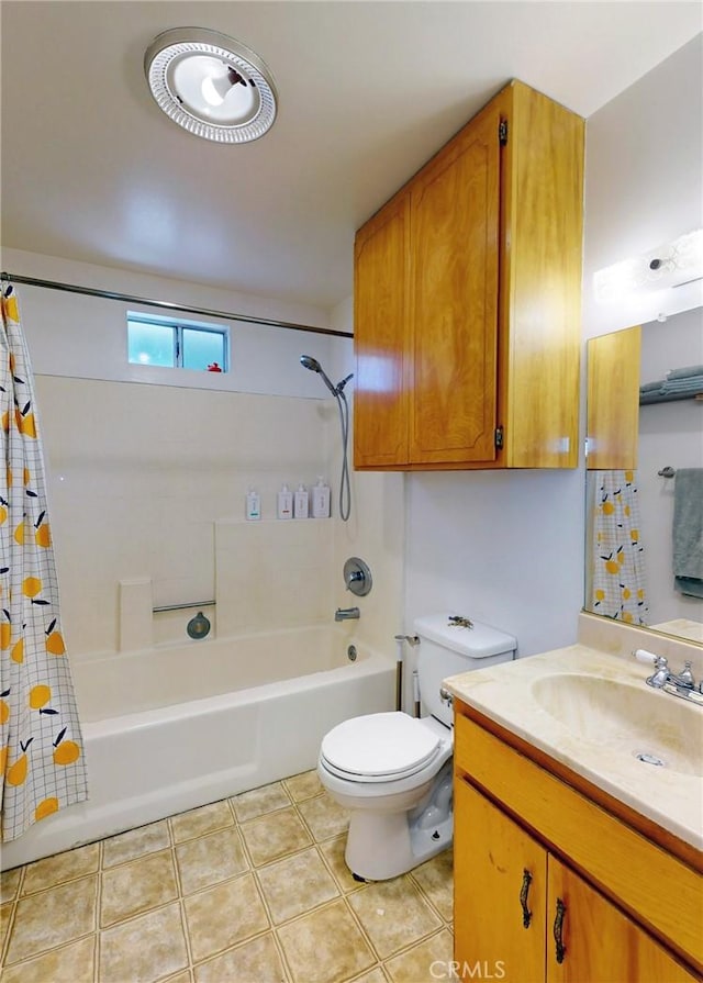 full bathroom featuring tile patterned floors, vanity, toilet, and shower / bathtub combination with curtain