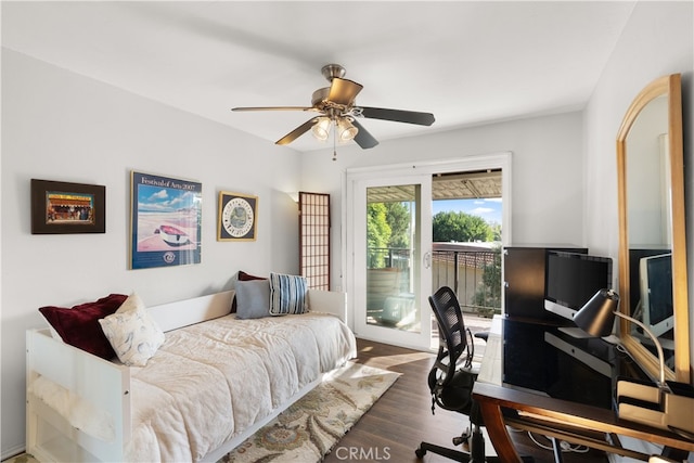 bedroom with ceiling fan, access to exterior, and dark wood-type flooring