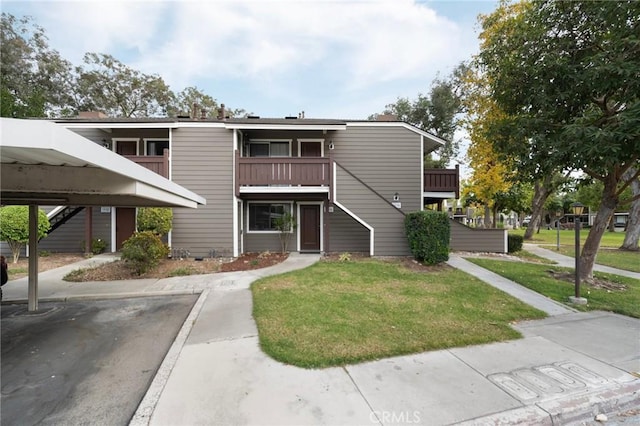19106 Alamo Ln Unit 169, Yorba Linda, CA 92886 - view of building exterior with covered and uncovered parking