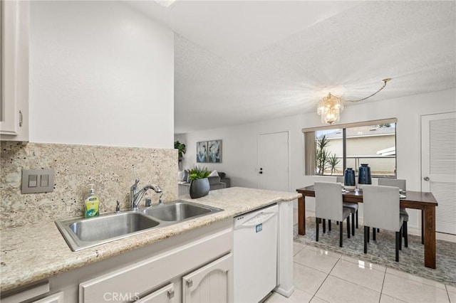 19106 Alamo Ln Unit 169, Yorba Linda, CA 92886 - kitchen featuring dishwasher, white cabinetry, a chandelier, and light countertops