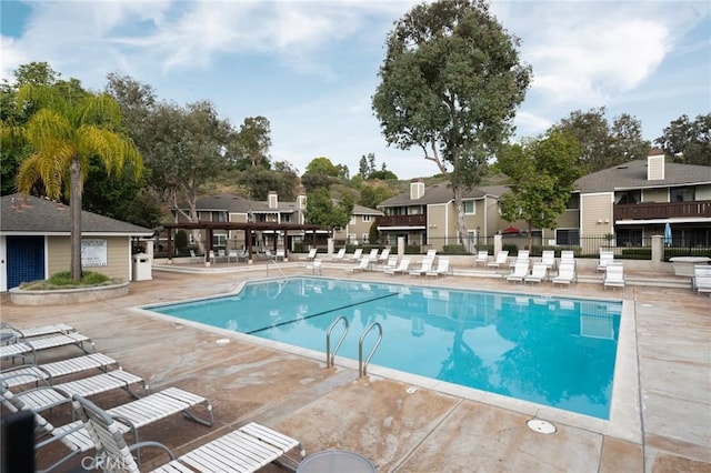 19106 Alamo Ln Unit 169, Yorba Linda, CA 92886 - community pool featuring a patio area and a residential view