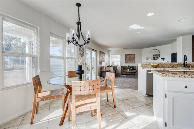 dining space featuring light tile patterned floors, baseboards, a notable chandelier, and recessed lighting