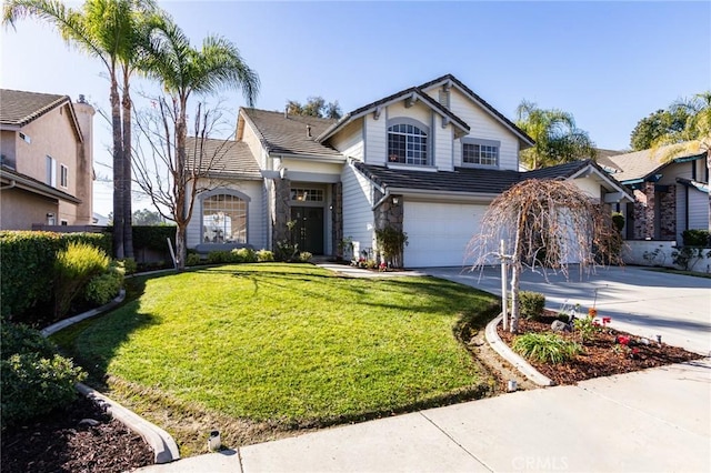 traditional-style house with a garage, a tile roof, driveway, and a front lawn