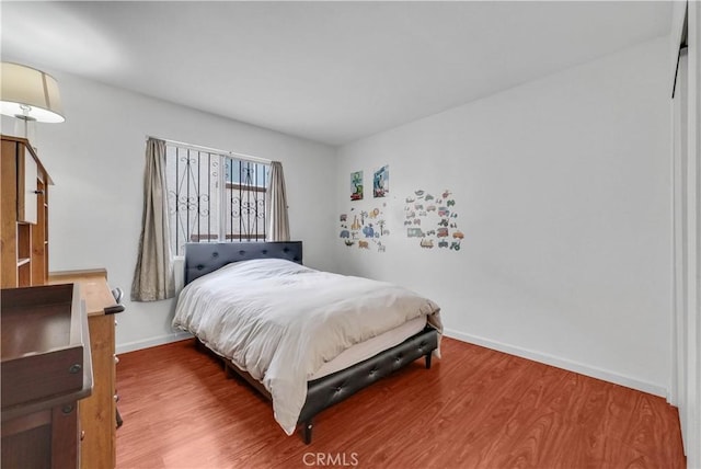 bedroom featuring hardwood / wood-style floors