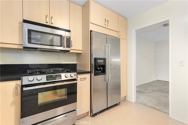 kitchen with appliances with stainless steel finishes