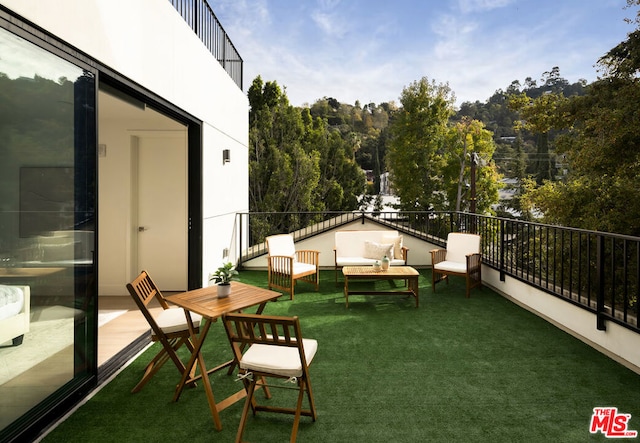 balcony featuring outdoor lounge area