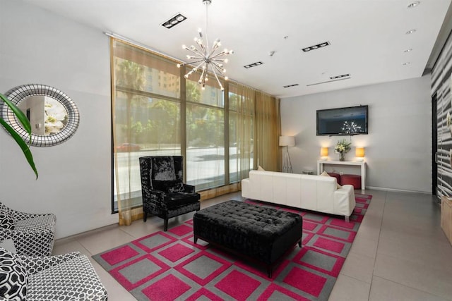 bedroom with tile patterned floors and a notable chandelier