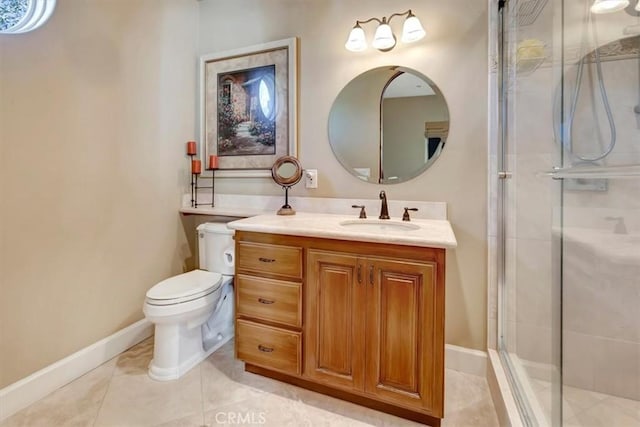 bathroom featuring tile patterned flooring, vanity, toilet, and a shower with shower door