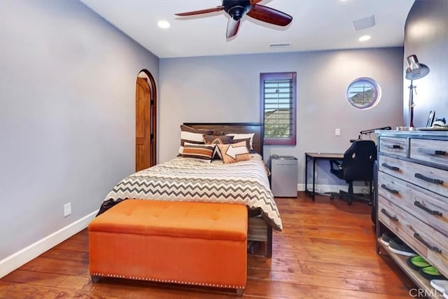 bedroom featuring ceiling fan and wood-type flooring