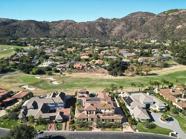 bird's eye view with a mountain view