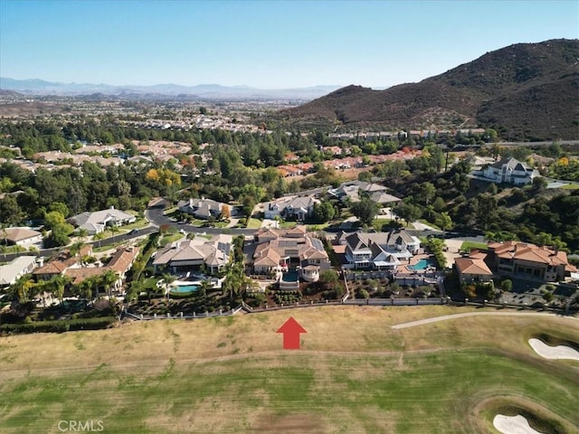 bird's eye view with a mountain view