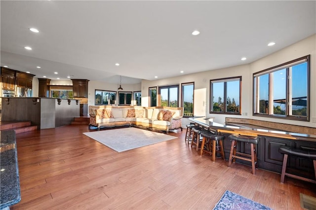 living room with light hardwood / wood-style floors