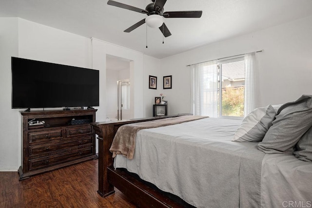 bedroom with ceiling fan and dark hardwood / wood-style flooring