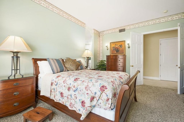 bedroom featuring light colored carpet