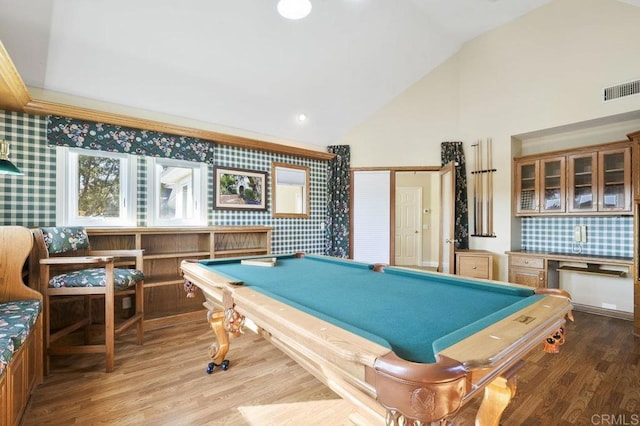 recreation room featuring lofted ceiling, wood-type flooring, and pool table