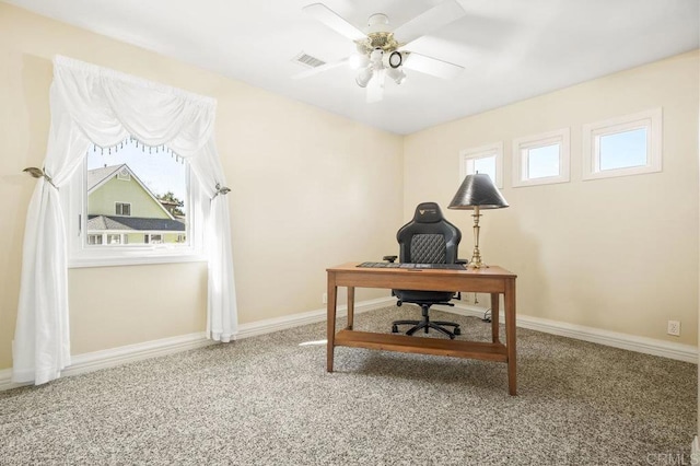 office area with carpet and ceiling fan