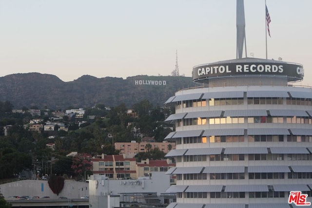 outdoor building at dusk featuring a mountain view