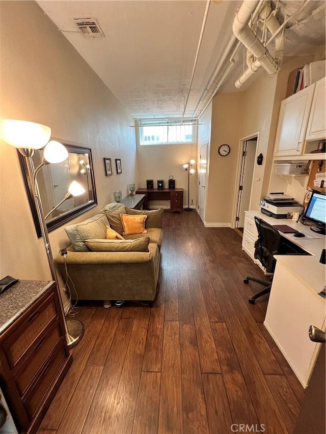 living room with dark wood-type flooring