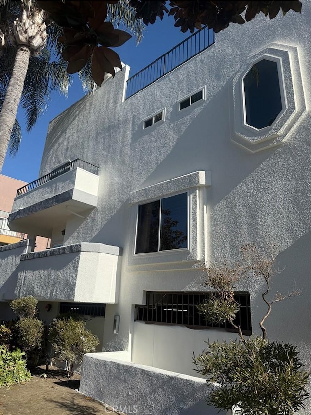 view of home's exterior with ceiling fan