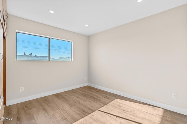 empty room featuring light hardwood / wood-style floors