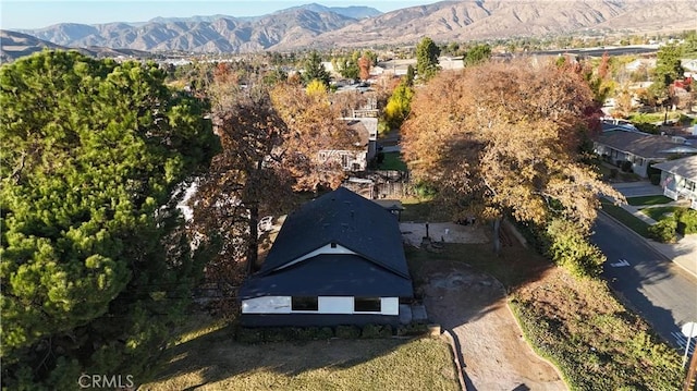 drone / aerial view featuring a mountain view