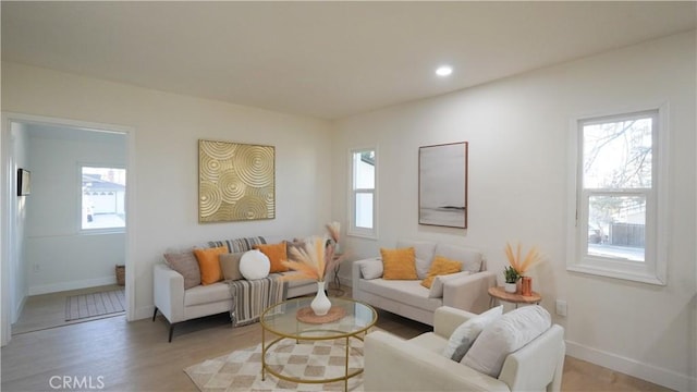 living room with light hardwood / wood-style floors