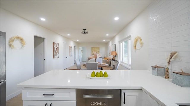 kitchen featuring white cabinets