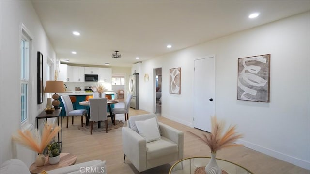 dining room featuring light hardwood / wood-style flooring